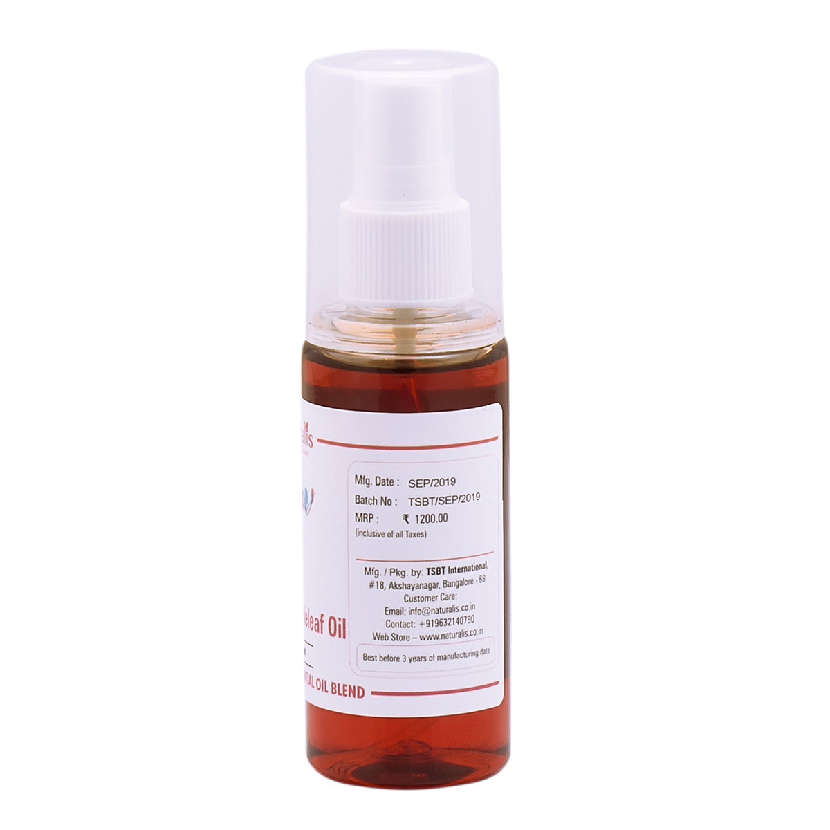 Naturalis Warming Massage Oil 100 ml bottle with product label